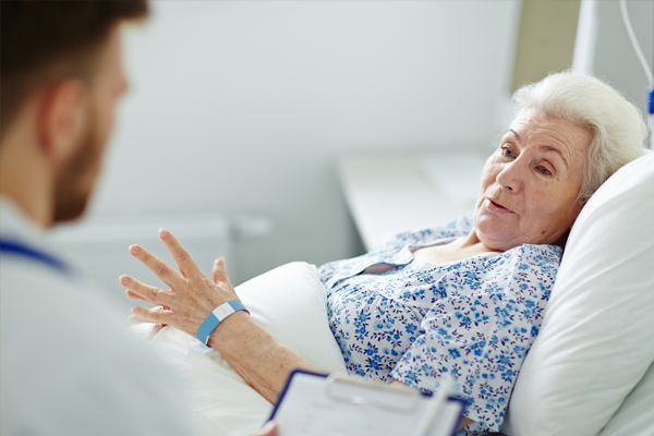 doctor talking to patient